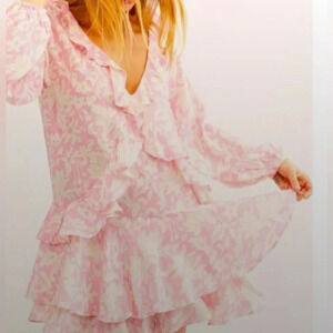 Free People Rebecca Floral Ruffle Mini Dress in baby pink. Size S